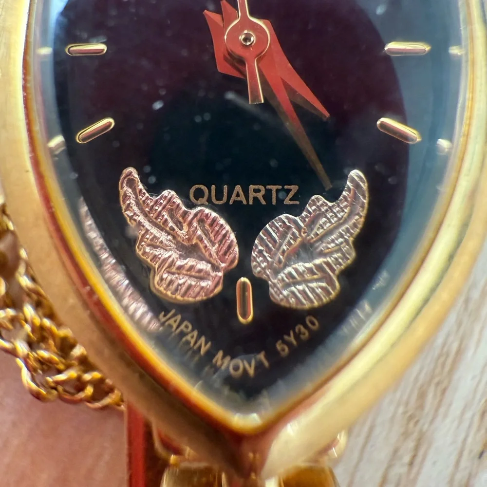 Lemann for black hills gold ladies black dial gold tone watch NEW BATTERY